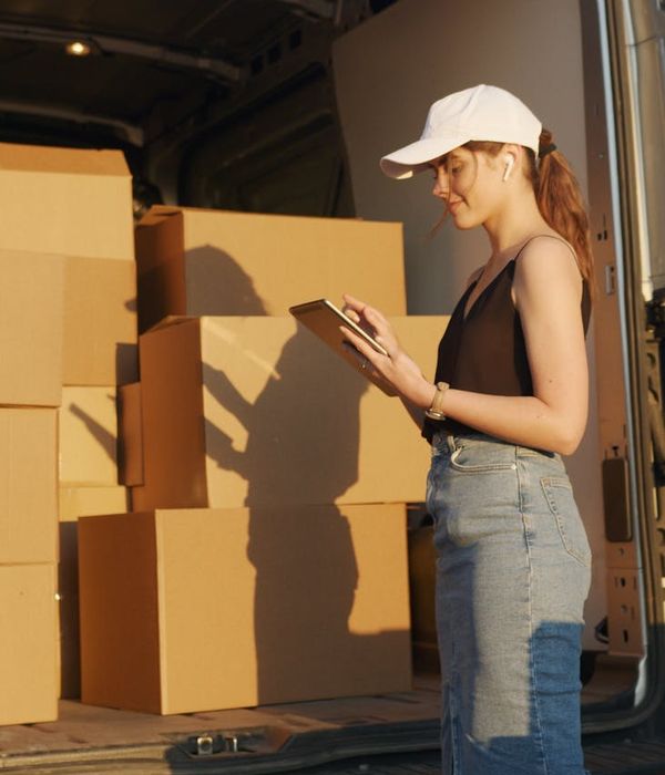 Professional woman manager coordinating transportation and logistics