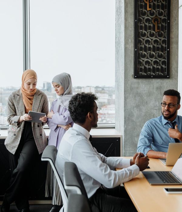 Team of professionals collaborating on logistics strategy and planning